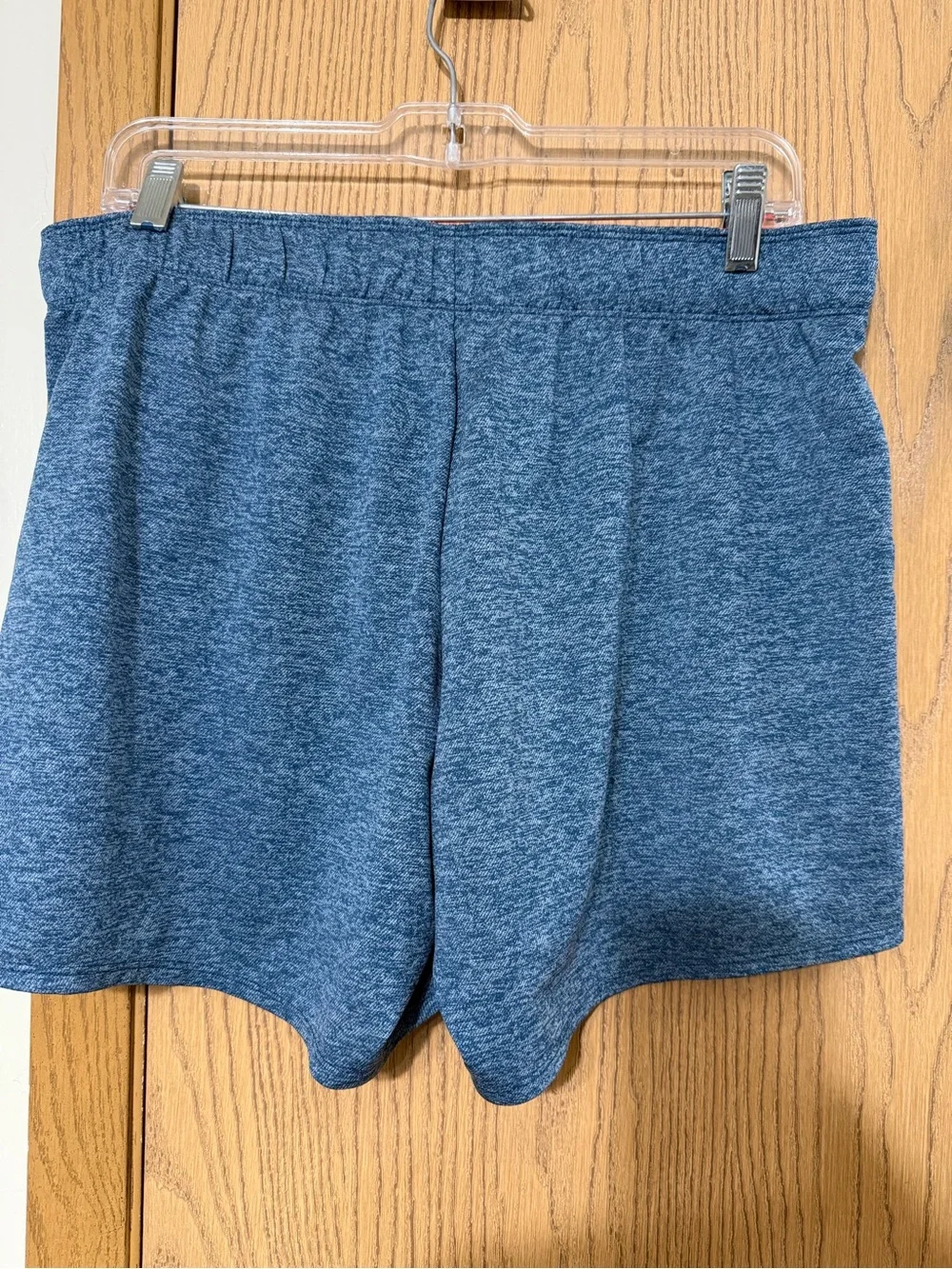 Nike Women's Heather Blue Athletic Shorts with Pink Swoosh